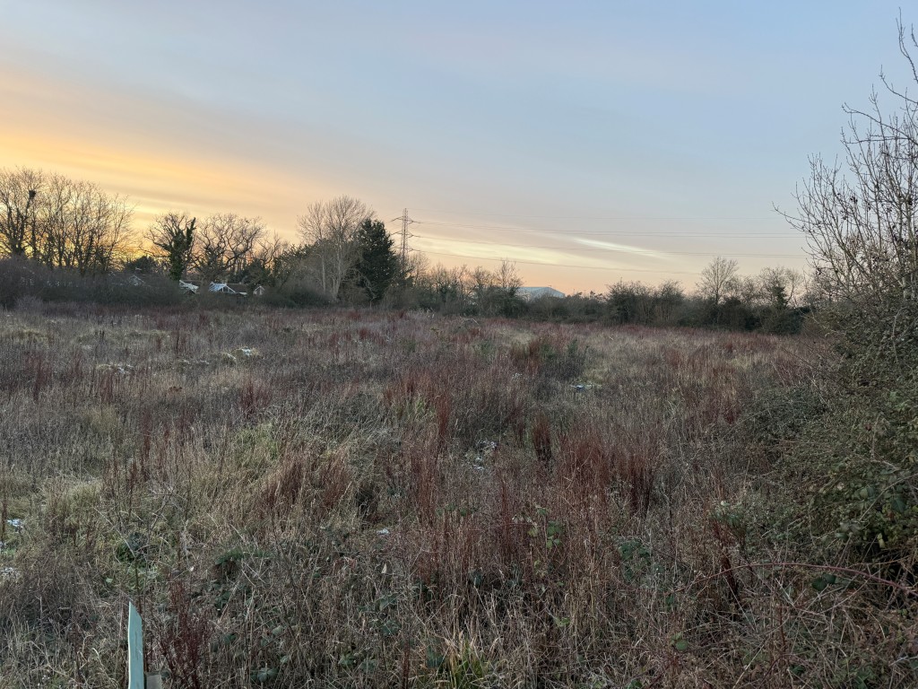 Lot: 50 - 1.6 ACRES OF LAND WITH POTENTIAL - View of land from west